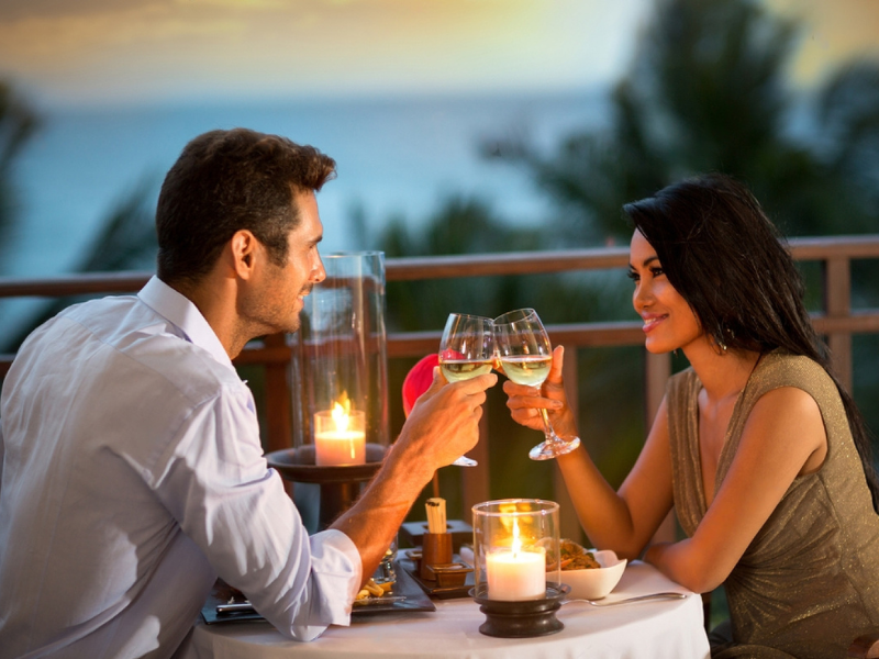 Romantic couple enjoying the essences of the Machismo Plus Sweet Surrender Scented Soy Candle, 9oz